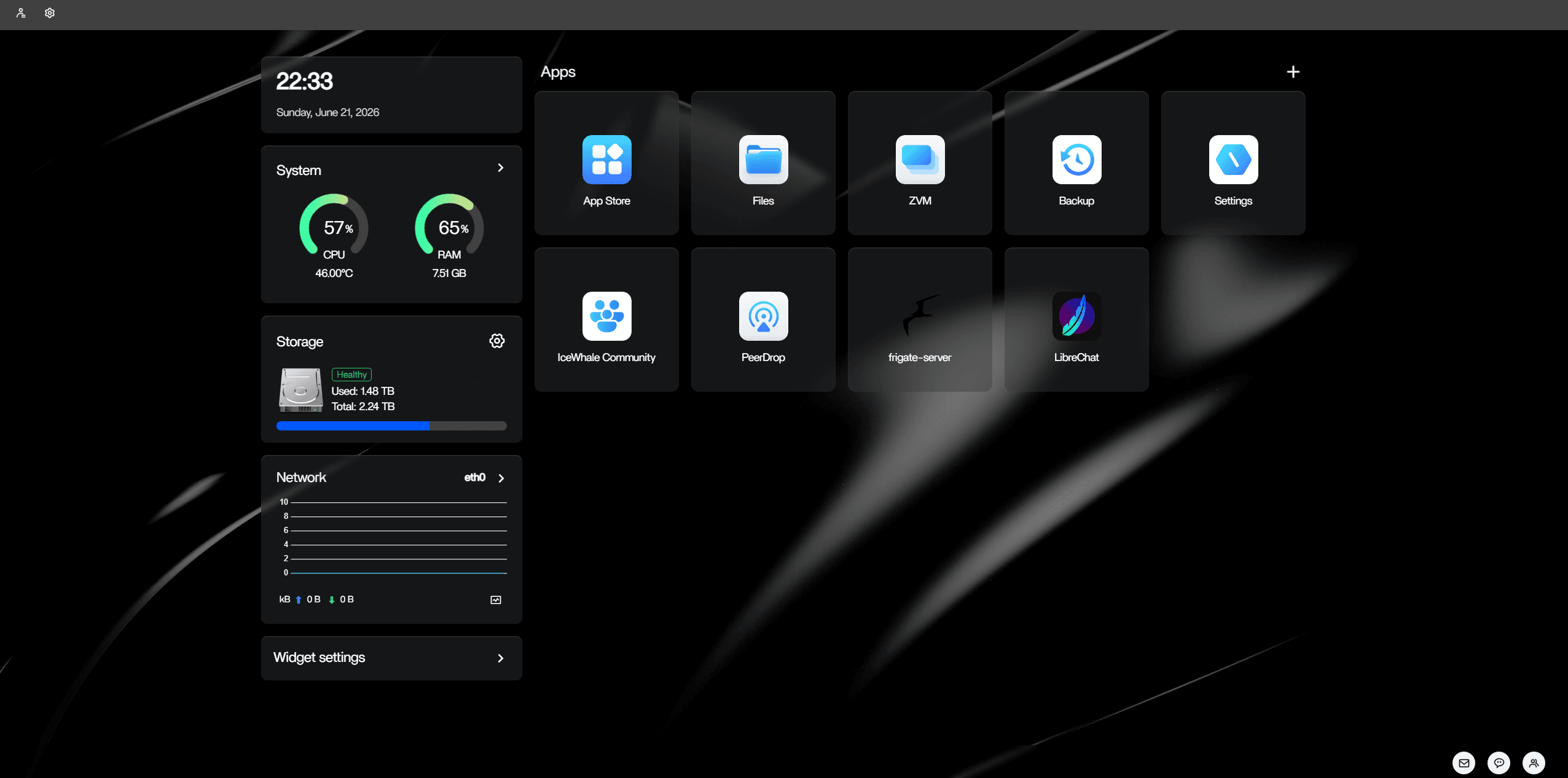 The ZimaOS desktop: app launcher and live system stats, with Frigate and LibreChat running side by side